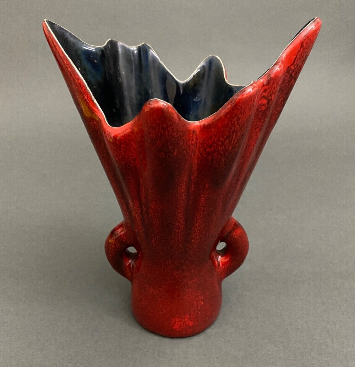 Free form red ceramic vase 1960 by J.L. or J.C.