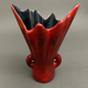 Free form red ceramic vase 1960 by J.L. or J.C.