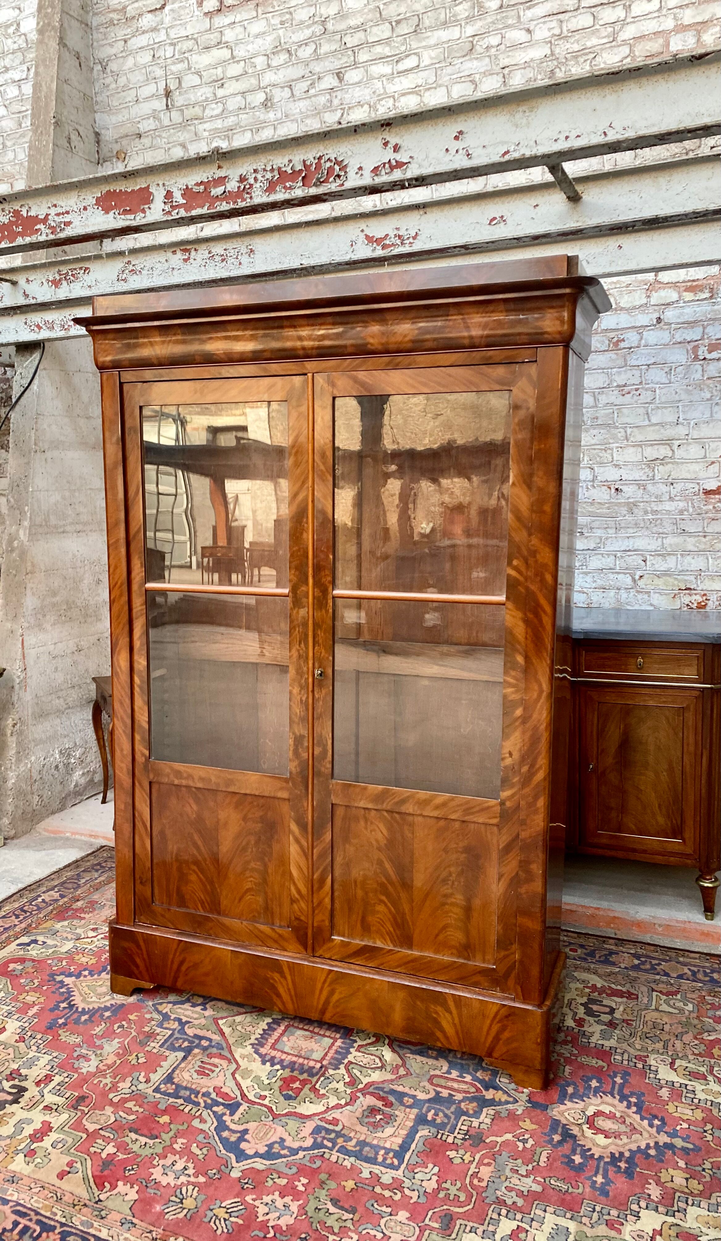 Library in mahogany flammé period Louis Philippe XIXth