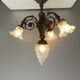 Art nouveau chandelier in bronze and pressed glass 1920