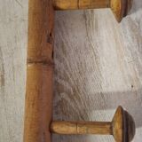 Turned wooden coat rack.