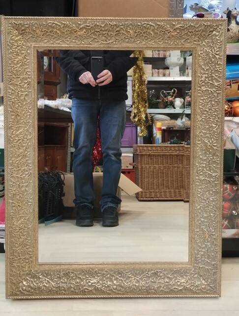 Rectangular mirror with its decorated frame