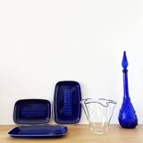 Blue-edged blown glass handkerchief vase