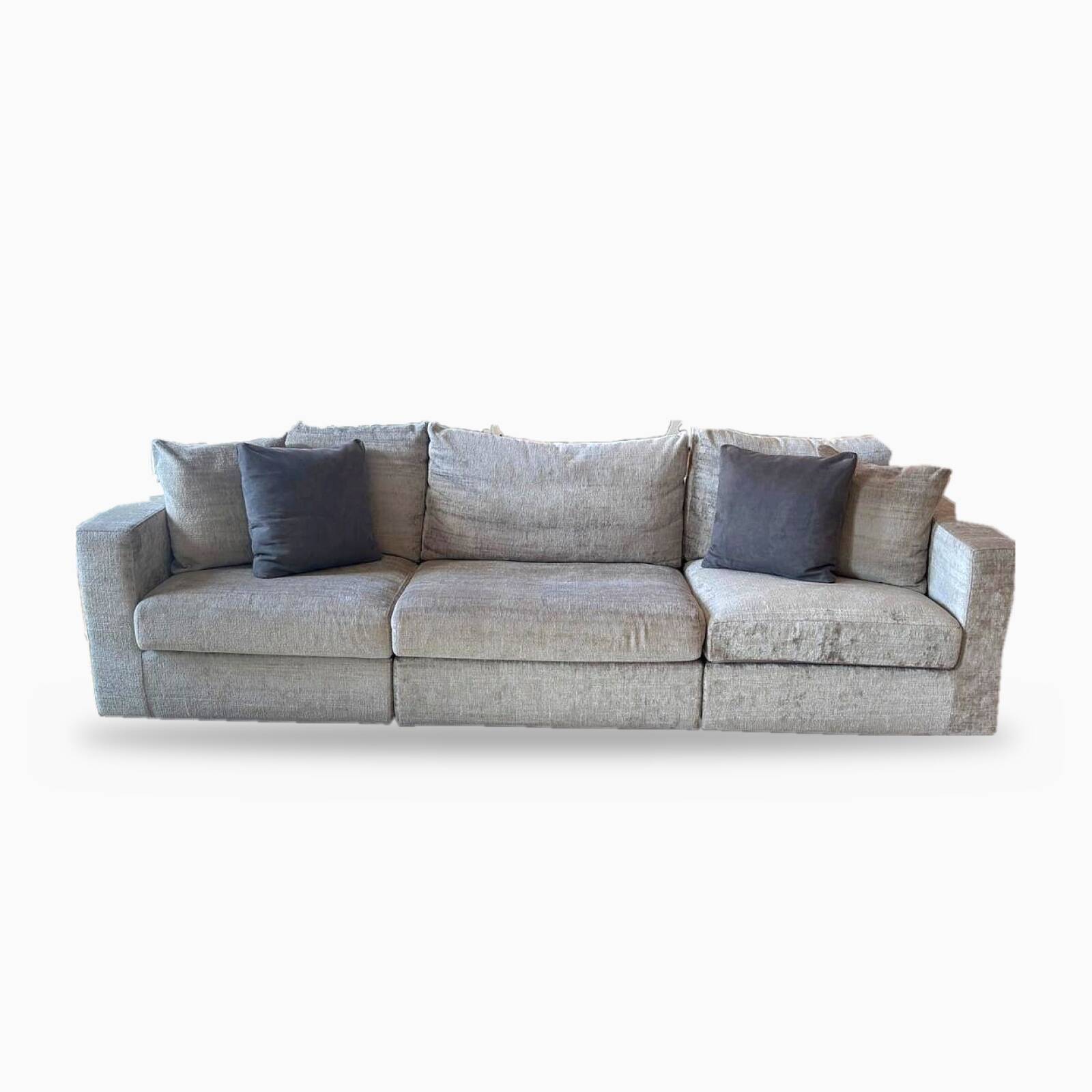 3-seater PMP Classy sofa in grey fabric and its 4 PMP cushions.
