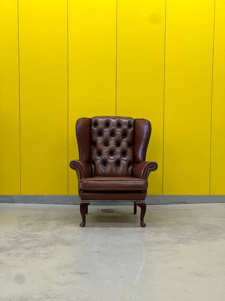 Fauteuil Chesterfield traditionnel anglais en cuir