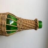 bottle surrounded by rattan 70s