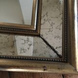 Golden mirror with 68 x 54 cm