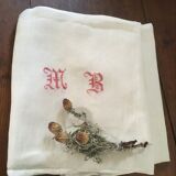 Damask tablecloth with double monogram M B.
