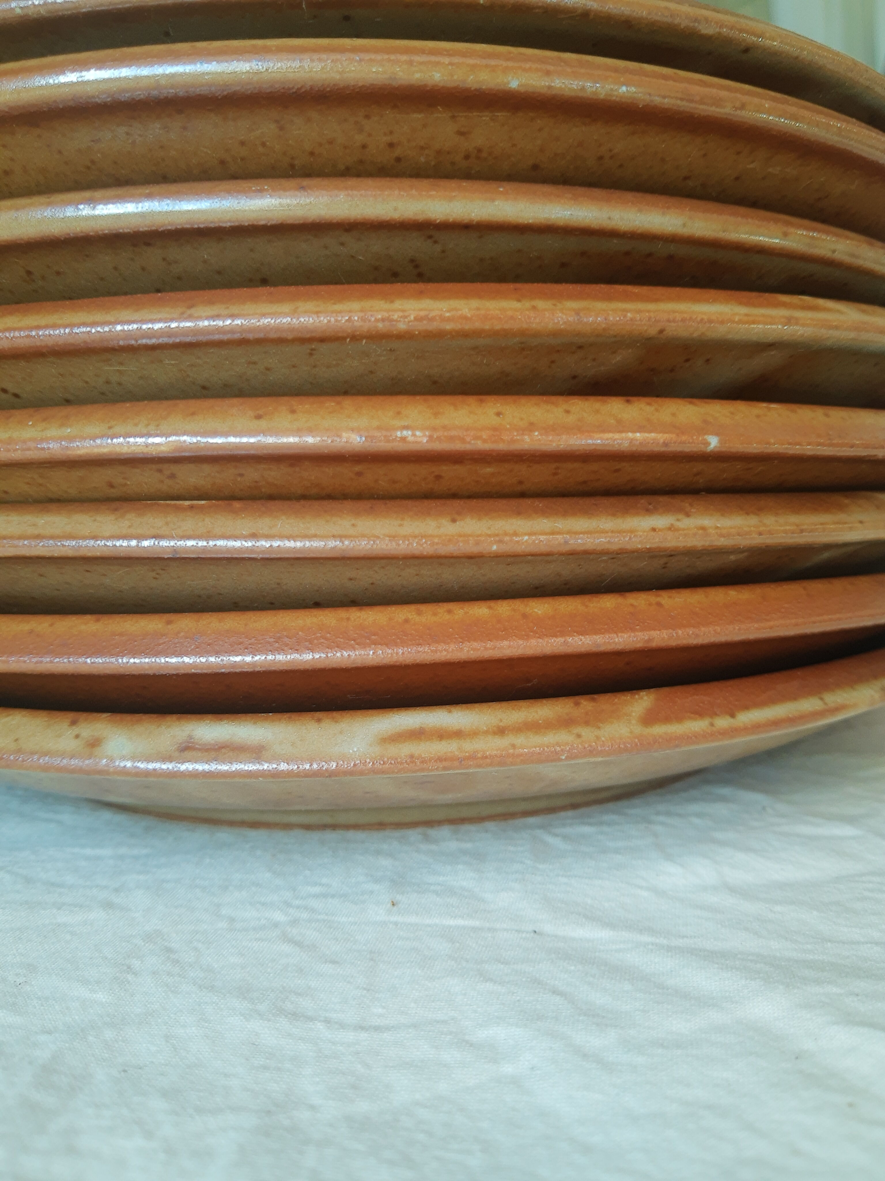 Set of 8 vintage brenne stoneware flat plates