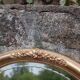 Miroir ovale vintage doré à décor floral et verre biseauté – 58 × 48 cm