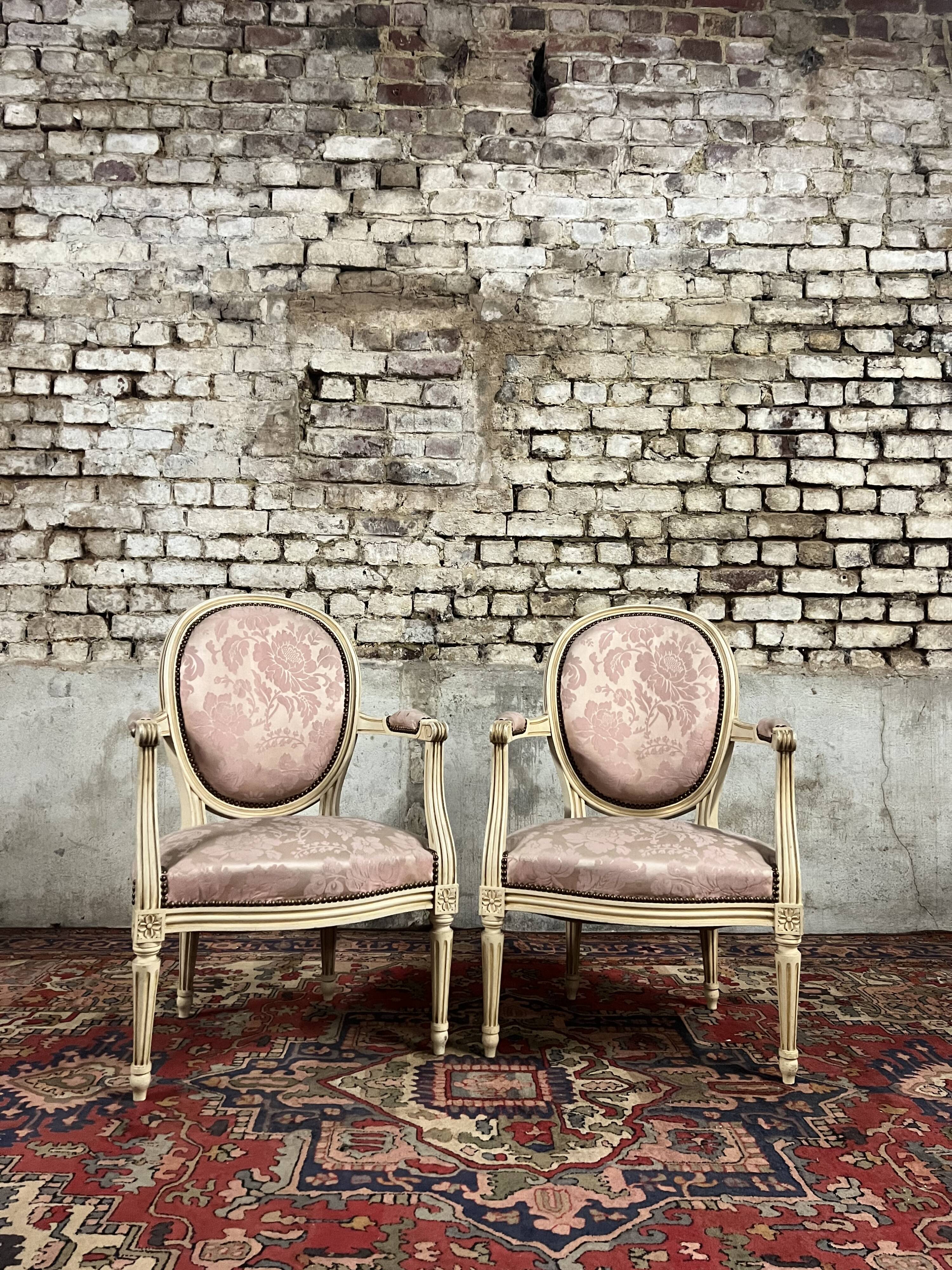 Pair of louis xvi style cream lacquered wood medallion back armchairs