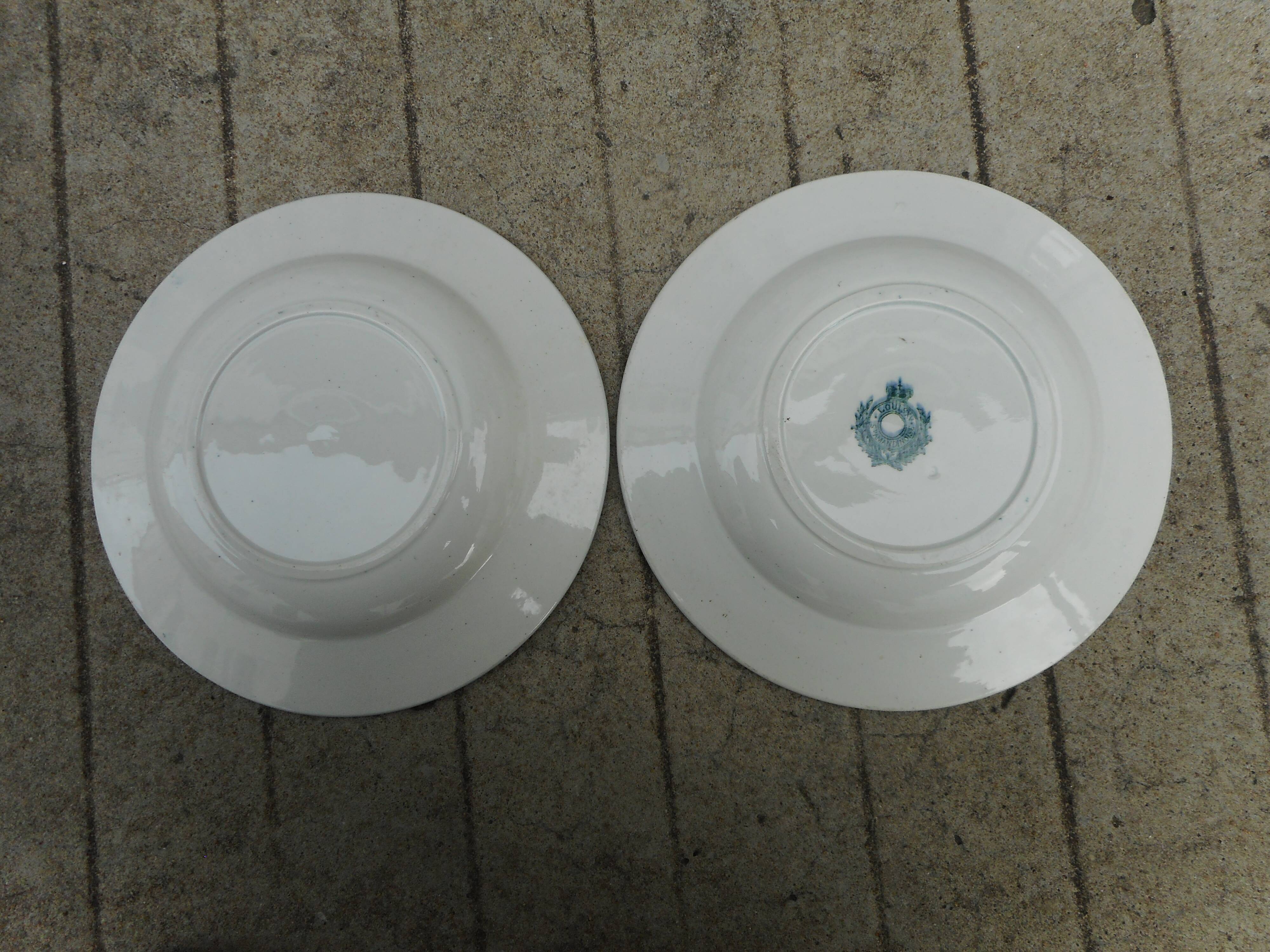 Two hollow plates made of earthenware