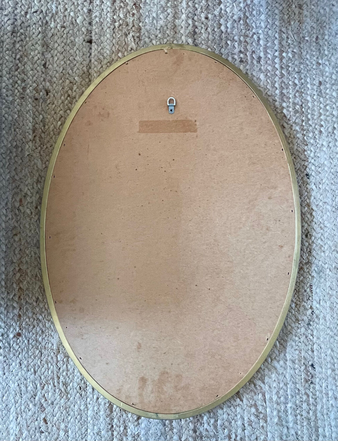 Oval mirror in carved wood
