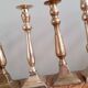 Set of 10 bronze-tinted brass candle holders 01 Pro