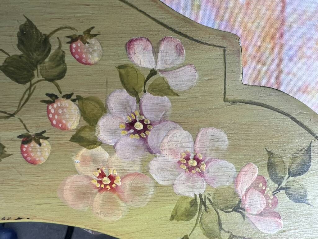 Shabby green mirror with flowers