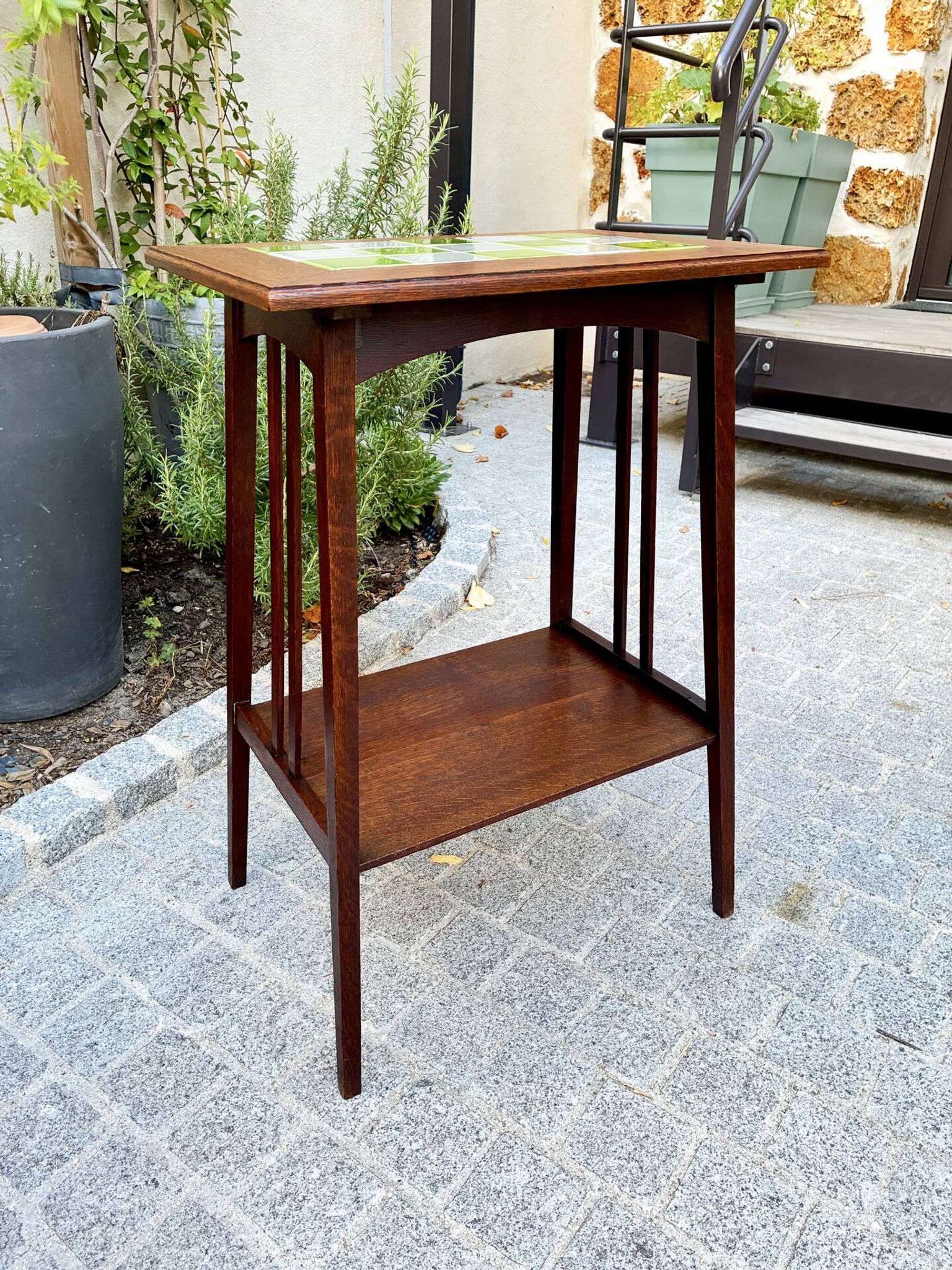Art Nouveau side table 1910 with double tops in dark oak.