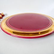 set of trivets, bottle coasters and knife holders in art de cherry-colored ceramic