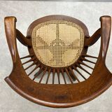 Swivel office chair in oak with a rattan seat.