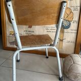 Old wooden and metal children's school chair