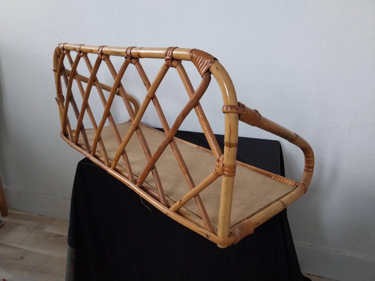 Rattan wall shelf