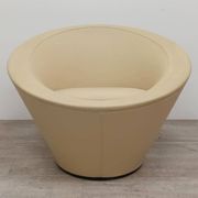Girola armchair from Tacchini in beige leather.