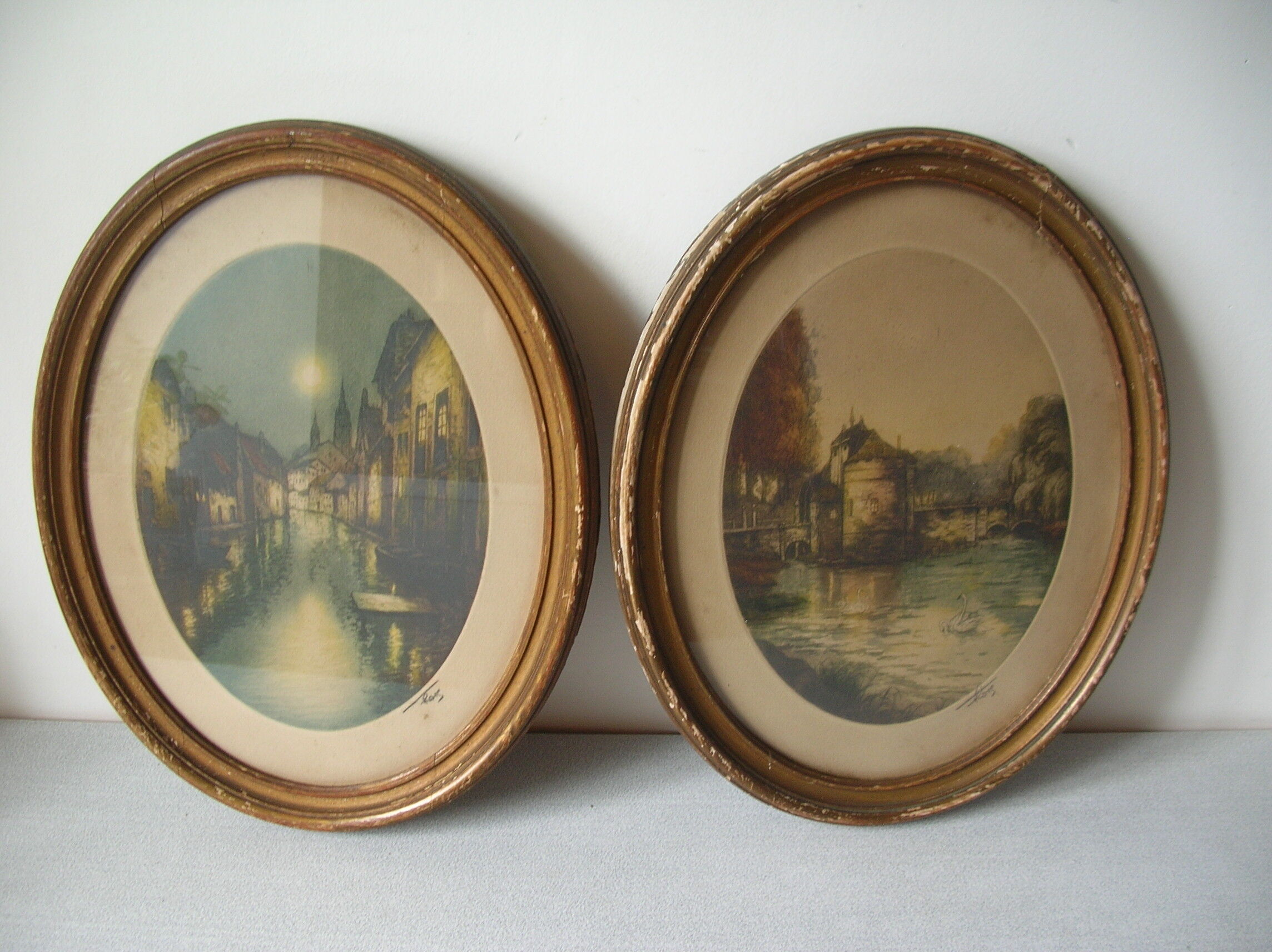 Old pair of lithographs house at the edge of the water signed wooden medallion frame