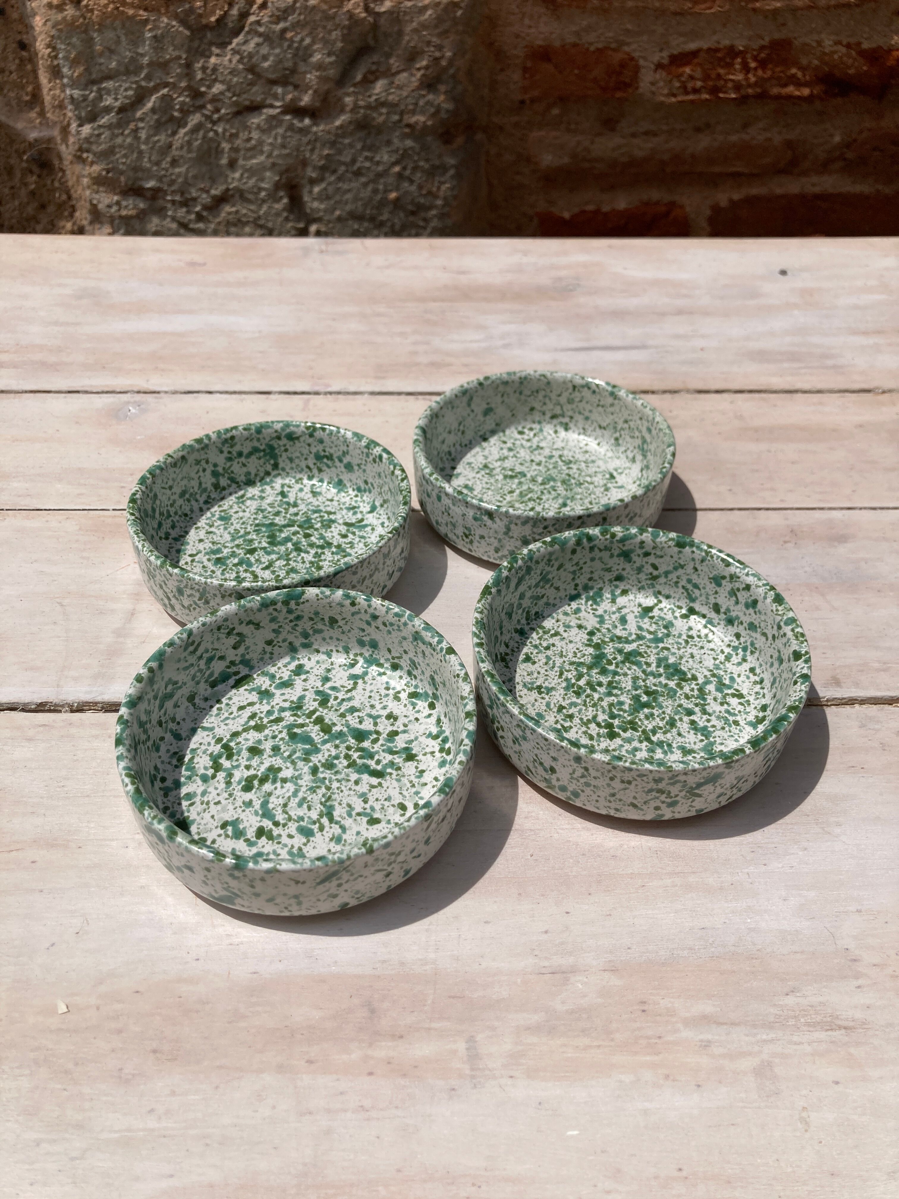 Four spotted green ramekins
