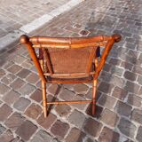 Bamboo folding chair and caning, leather and brass