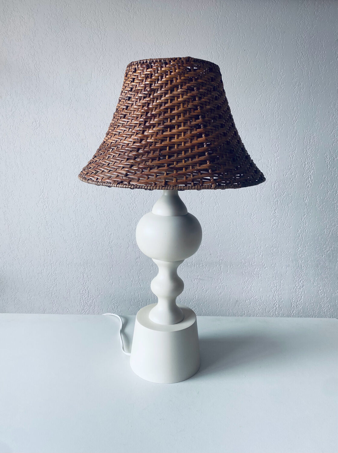 Large turned white wooden lamp