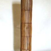 Mid-century rattan floor lamp, in the style of Louis Sognot.