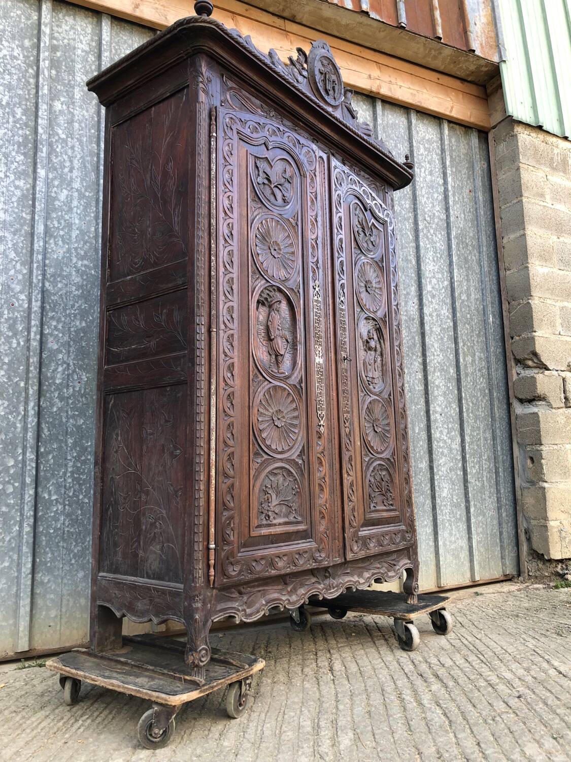 Antique Breton oak cabinet, richly carved