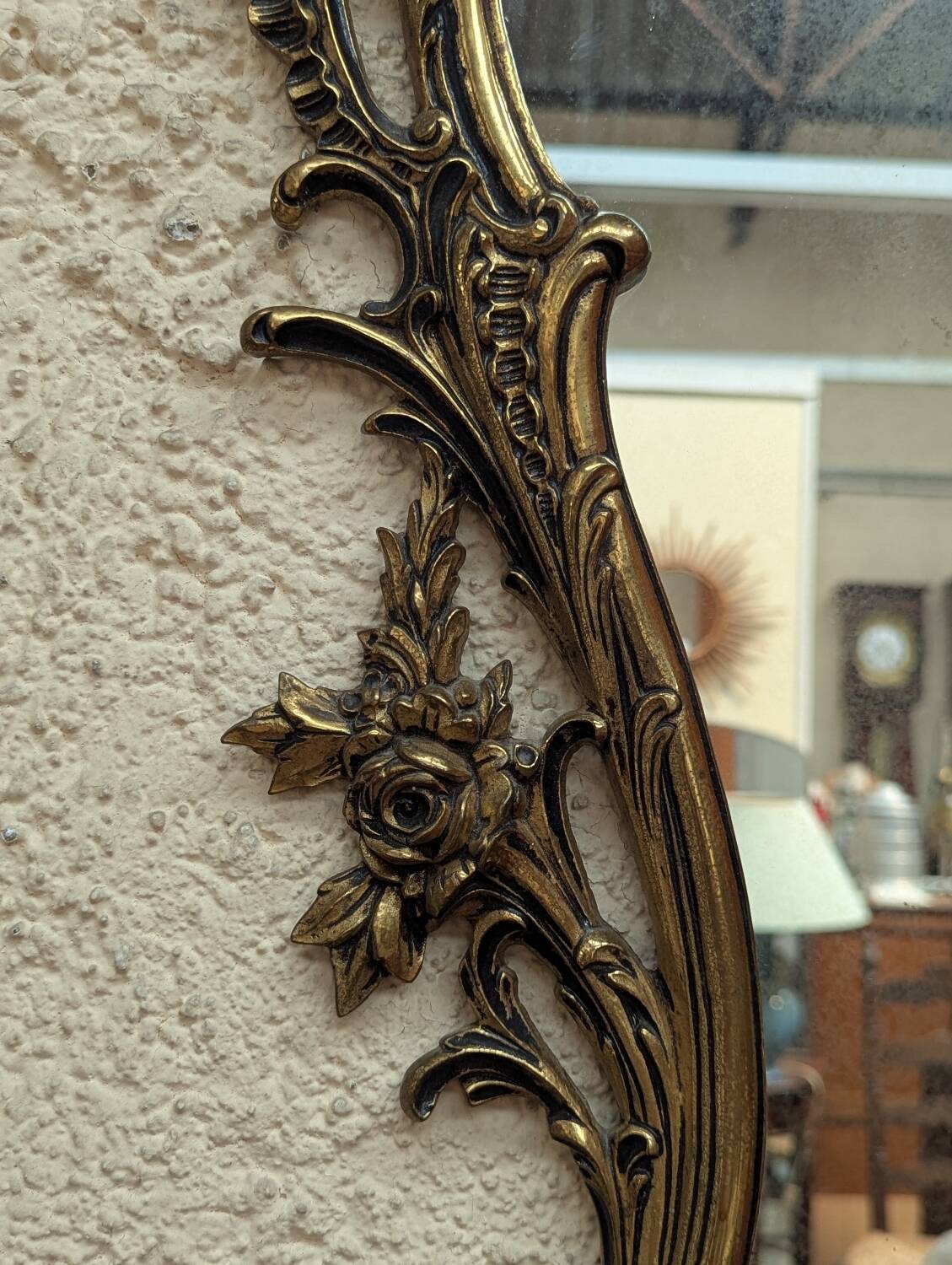Gold metal wall mirror