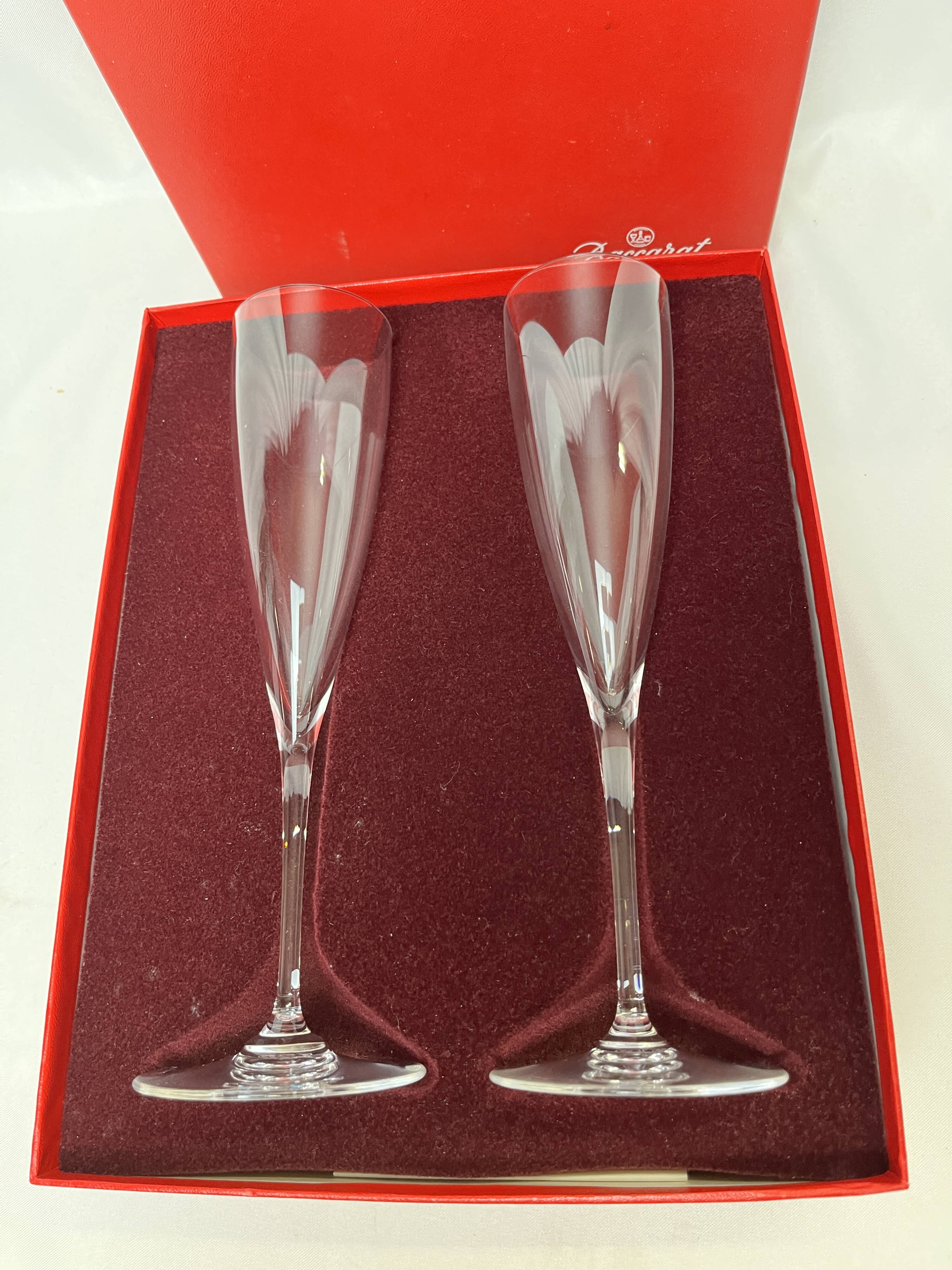 Baccarat, two Dom Pérignon crystal champagne flutes