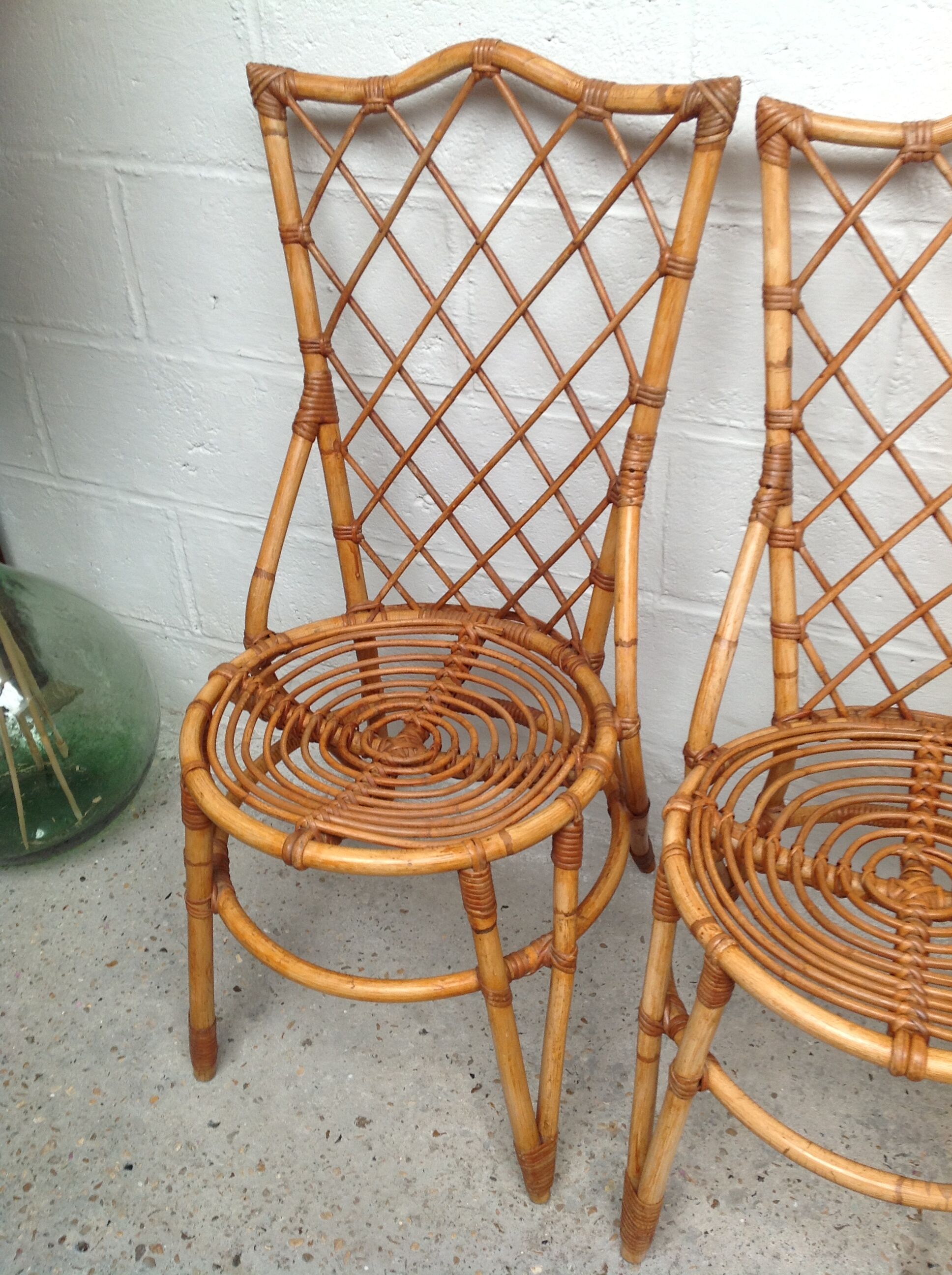 Rattan chairs by Louis Sognot