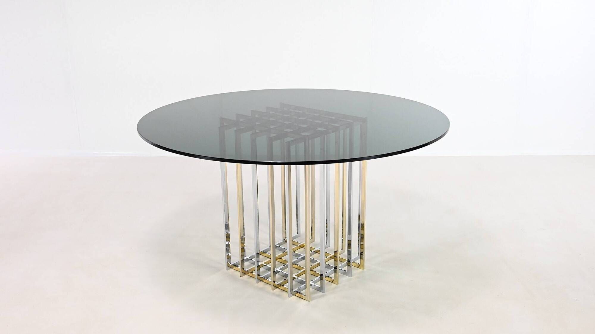 Pierre cardin, “cage” dining table, chrome and gilded steel. france, circa 1970.