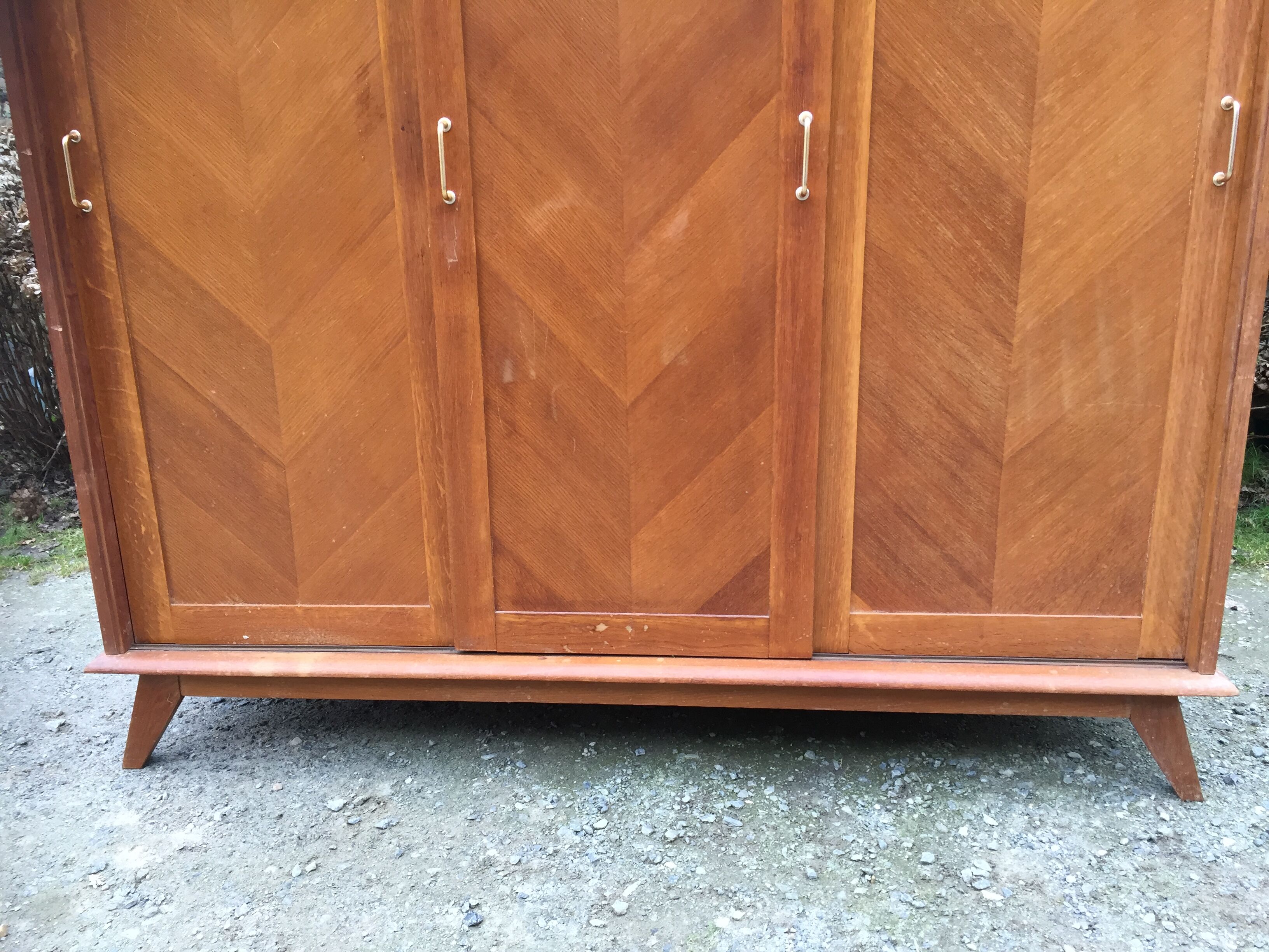 Vintage wardrobe compass feet with 3 sliding oak doors.