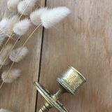 Chiseled brass candle holder