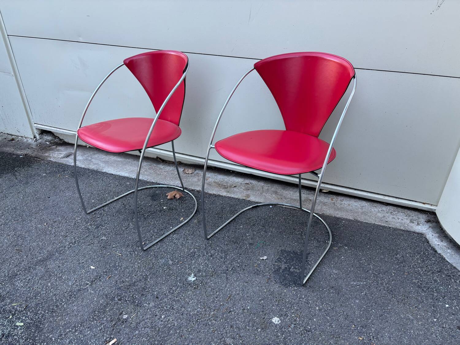 Pair of Linda chairs by Arrben in red leather