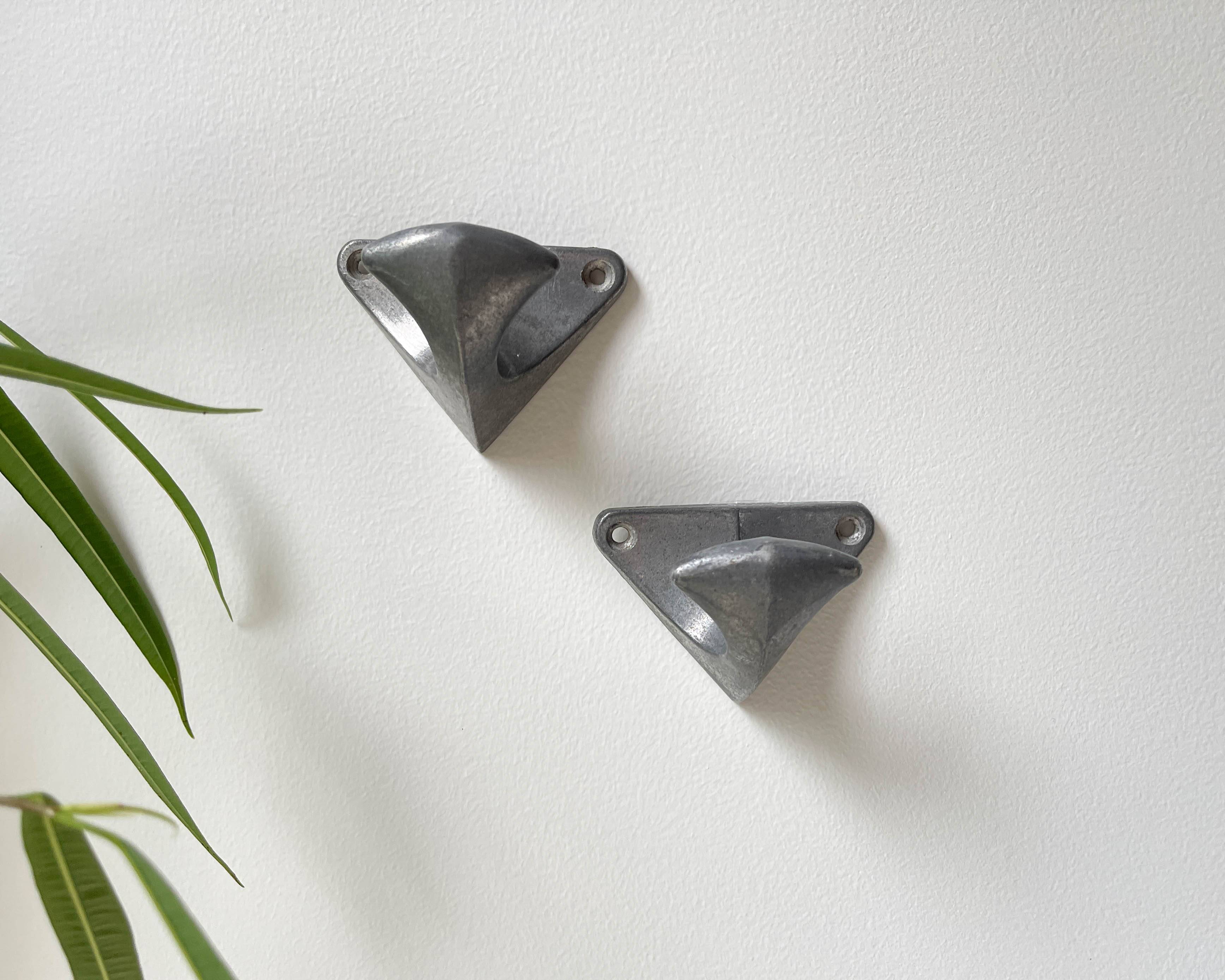 Vintage cast aluminum wall hooks