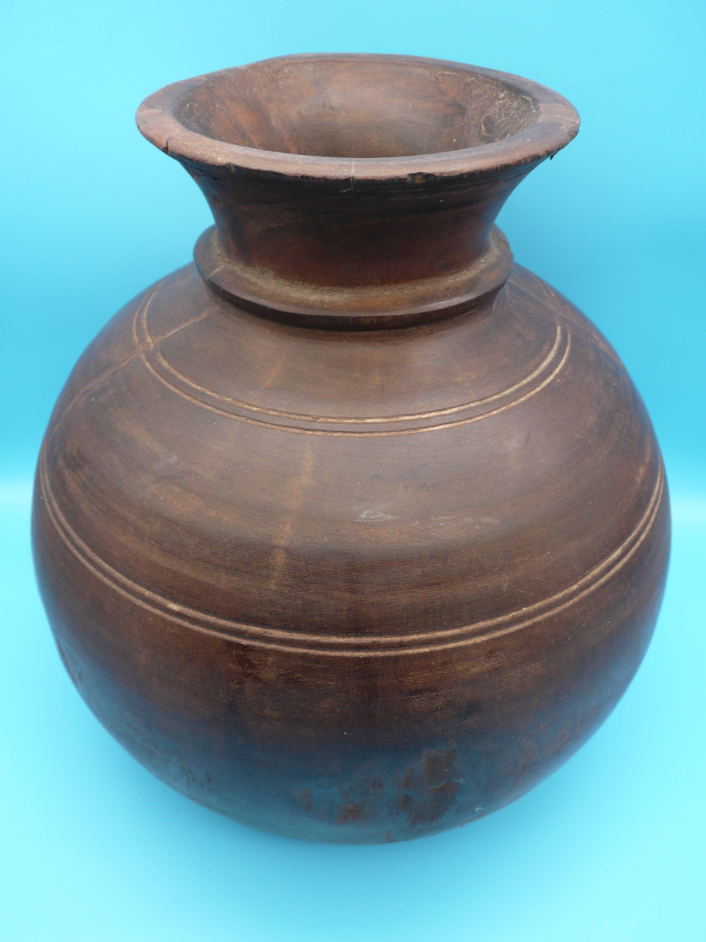 Large carved wooden pot / India