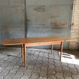 Extendable teak dining table