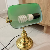 Gold and green banker’s desk lamp.
