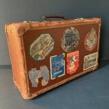 Old travel suitcase and legendary stickers, 1920