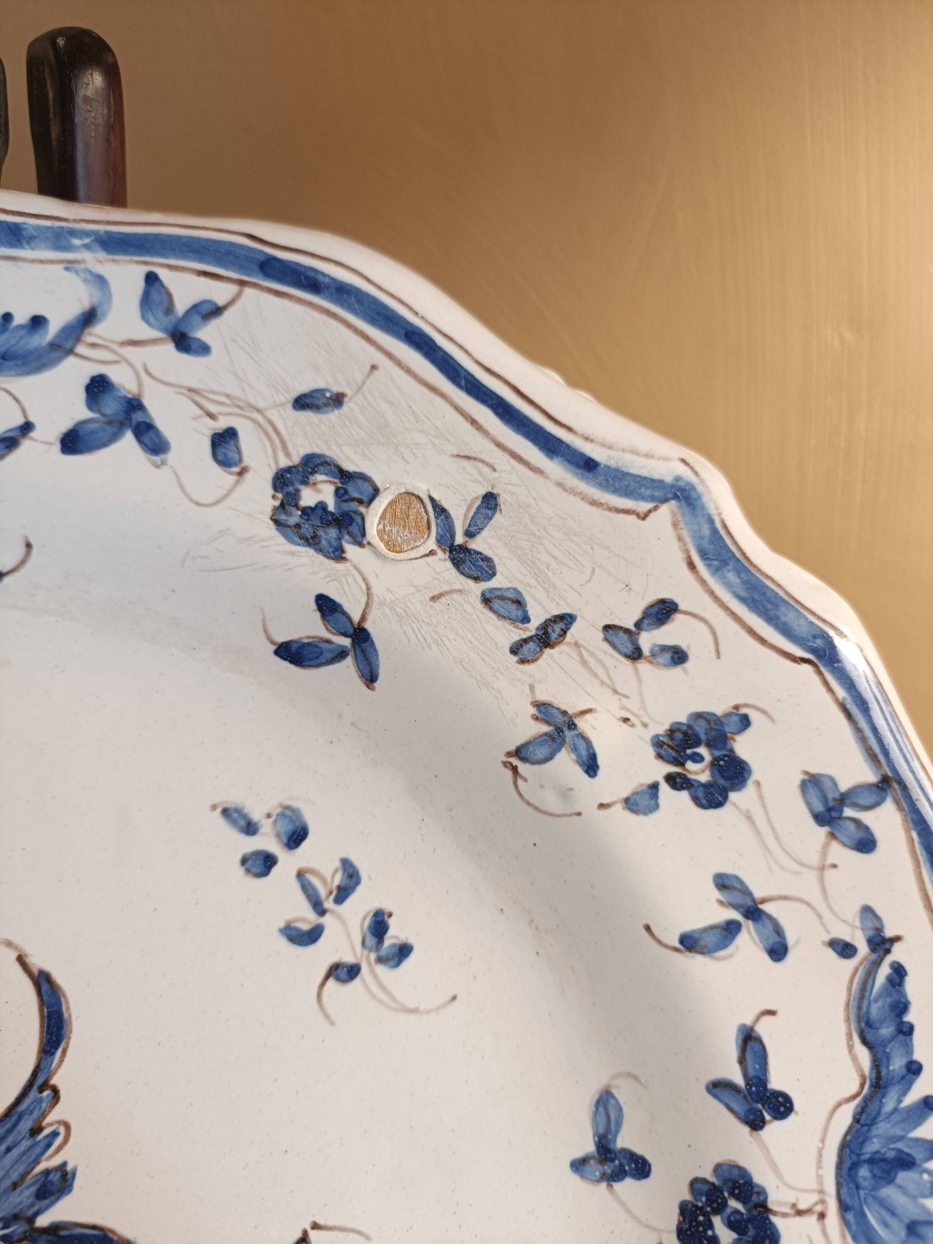 Old Moustiers faience plate blue and white with blue ibis decoration.