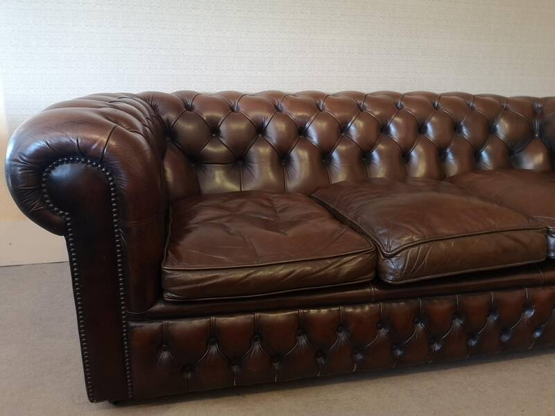 Vintage three-seater brown leather Chesterfield sofa