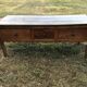 Antique Louis XV paneled table with 3 front drawers in solid cherry wood