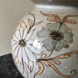Glazed stoneware ball vase decorated with flowers