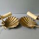 Pair of golden metal shell sconces