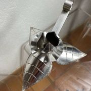 Silver-plated metal flower candle holder