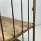 Vintage industrial iron and wood shelves on wheels